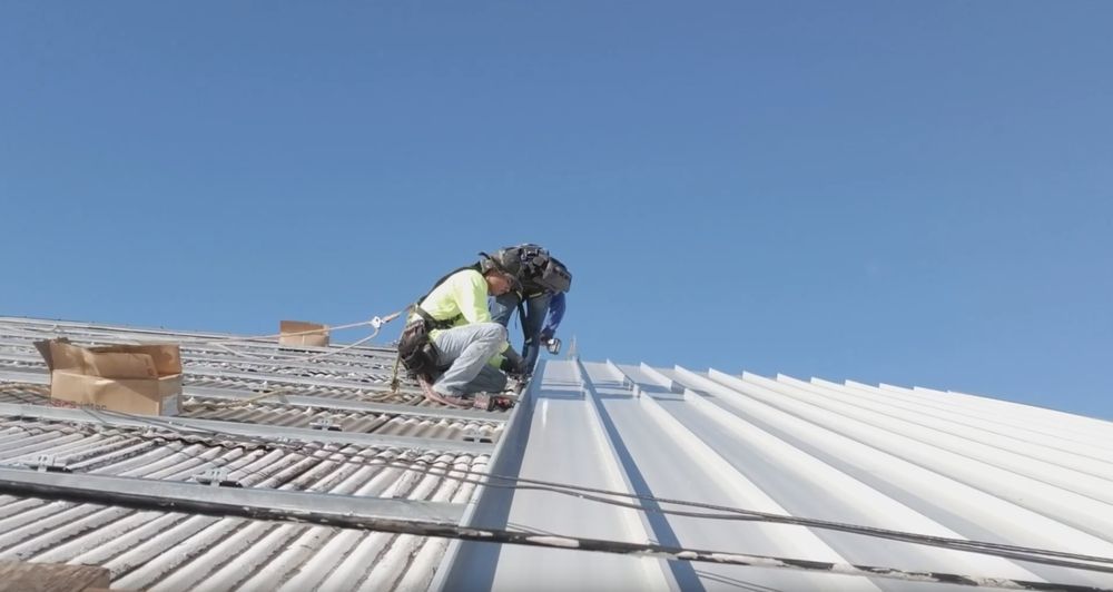 Slide of Action Roofing Hawaii