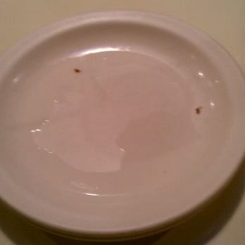 Zachary's Chicago Pizza - Dirty plate... Looks like burnt pizza crust remnants - Pizza Near Me - Berkeley, California