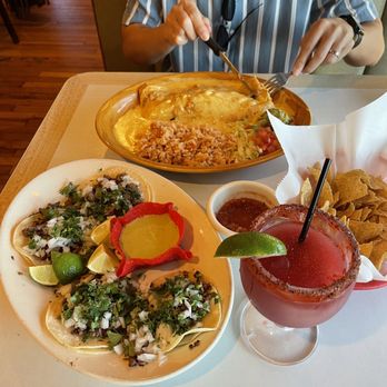Burros Tex Mex Bar and Grill - Smothered Burro Con Queso, Beef Fajita Tacos, Sangria Rita - Cocktail Bars Near Me - Round Rock, Texas Burros Tex Mex Bar and Grill - Smothered Burro Con Queso, Beef Fajita Tacos, Sangria Rita - Cocktail Bars Near Me - Round Rock, Texas