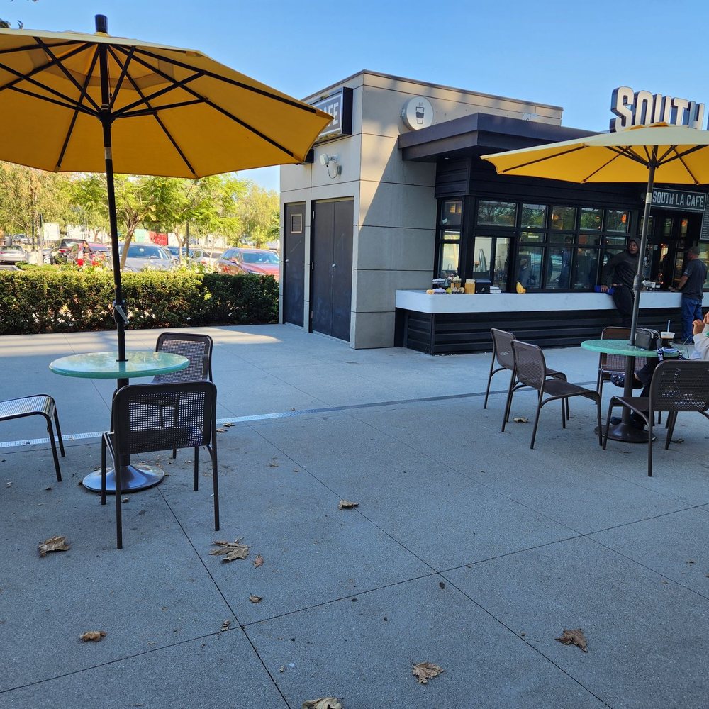 South LA Cafe - tables and umbrellas outside - Coffee & Tea Near Me - Los Angeles, California