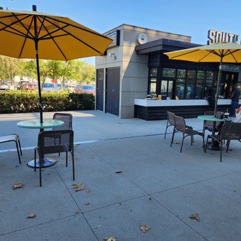 South LA Cafe - tables and umbrellas outside - Coffee & Tea Near Me - Los Angeles, California South LA Cafe - tables and umbrellas outside - Coffee & Tea Near Me - Los Angeles, California