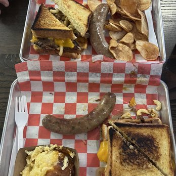 Bob’s Backyard Barbeque - Bob's Mac & Moo Sandwich - Large, cheese Cheesy Potatoes - Single, Chips, Jalapeño Cheese Brat - Barbeque Near Me - Lancaster, Ohio Bob’s Backyard Barbeque - Bob's Mac & Moo Sandwich - Large, cheese Cheesy Potatoes - Single, Chips, Jalapeño Cheese Brat - Barbeque Near Me - Lancaster, Ohio