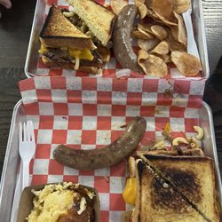 Bob’s Backyard Barbeque - Bob's Mac & Moo Sandwich - Large, cheese Cheesy Potatoes - Single, Chips, Jalapeño Cheese Brat