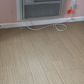 Merry Maids - Garbage on the floor when monody has been in this room since the cleaning - Home Cleaning Near Me - Freeport, New York