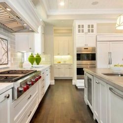 JNL Marble & Granite - JNL tilework for subway tile backsplash and medallion. JNL stonework for the kitchen countertops.