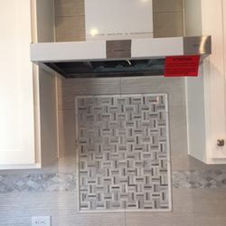 Frank Espinosa Ceramic Tile - Backsplash with accent wall design
