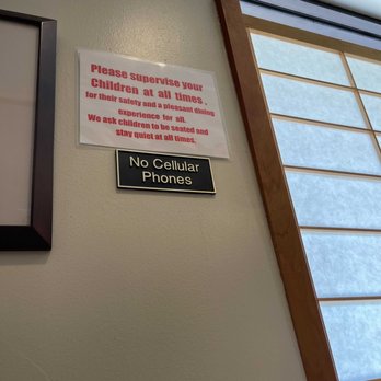 Sazan Restaurant - a no cellular phone sign on the wall - Japanese Near Me - Ardsley, New York