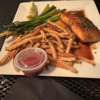 The Island Hideaway - Seasoned Salmon with fries and asparagus! - Seafood Near Me - Solomons, Maryland The Island Hideaway - Seasoned Salmon with fries and asparagus! - Seafood Near Me - Solomons, Maryland