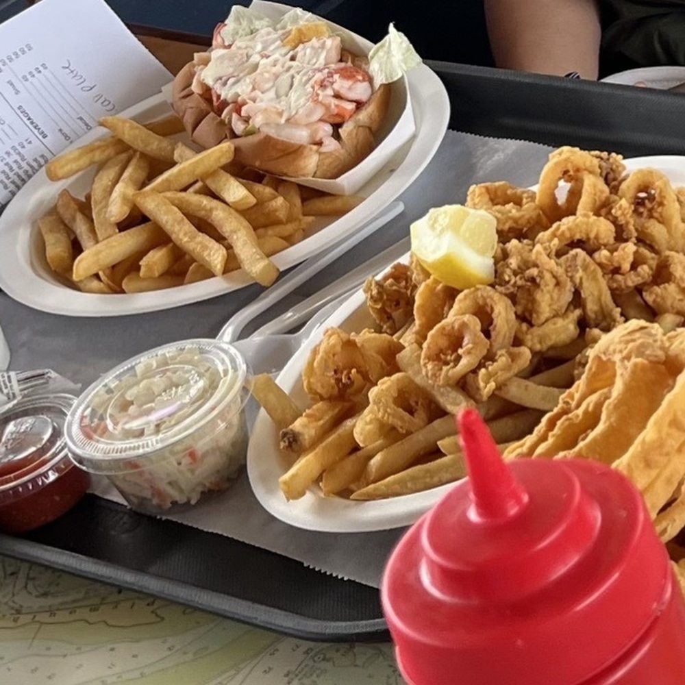 Wood's Seafood - Lobster roll Sandwich, calamari, and onion rings - Seafood Near Me - Plymouth, Massachusetts Wood's Seafood - Lobster roll Sandwich, calamari, and onion rings - Seafood Near Me - Plymouth, Massachusetts