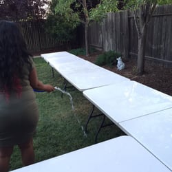 Diosdados Tables & Chairs - My pregnant wife washing tables off