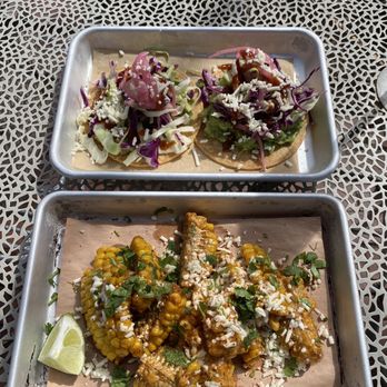 Muchacho - Tostaditas on top and street corn ribs on bottom. Both $5 for happy hour - Tacos Near Me - Atlanta, Georgia Muchacho - Tostaditas on top and street corn ribs on bottom. Both $5 for happy hour - Tacos Near Me - Atlanta, Georgia