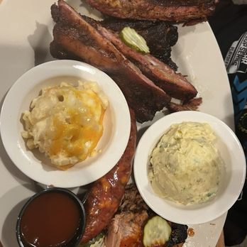 Jim 'N Nick's Bar-B-Q - Mr. Jim's Combo Plate: Spare Ribs, Pulled Pork, jalapeño cheddar sausage, Mac & Cheese, Potato Salad - Barbeque Near Me - Concord, North Carolina