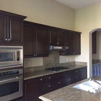 Son Cabinetry & Design - After- beautiful dark walnut, they built custom cabinets for butler pantry, granite looks better with the dark cabinets - Cabinetry Near Me - Palm Desert, California