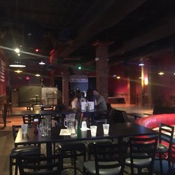 The Revolution Darts & Billiards - The far side of the photo is a HUGE dance floor on a Saturday night. Why is this empty?