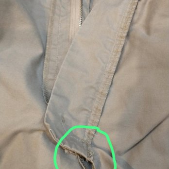 Mega Cleaners - Shorts with small hole just below newly installed zipper - Laundry Services Near Me - Troy, Michigan
