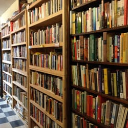 Yellow Dog Bookshop - Soooo many books! We have a little bit of everything at Yellow Dog Bookshop. This is our fiction wall...