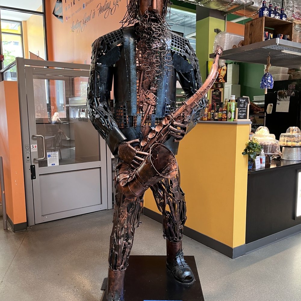 Worcester Public Market - a bronze statue of a man with a crown on his head - Food Court Near Me - Worcester, Massachusetts Worcester Public Market - a bronze statue of a man with a crown on his head - Food Court Near Me - Worcester, Massachusetts