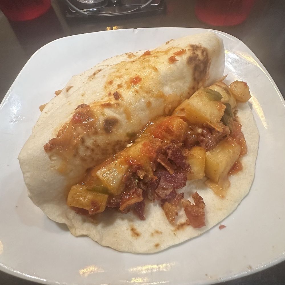 Sandra's Mexican Restaurant - Papa ranchera with bacon - Mexican Near Me - San Antonio, Texas Sandra's Mexican Restaurant - Papa ranchera with bacon - Mexican Near Me - San Antonio, Texas