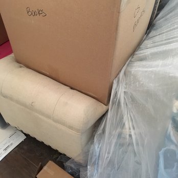 Aggie Movers Company - Boxes left on the main floor, on top of furniture potentially damaging the furniture. - Movers Near Me - College Station, Texas
