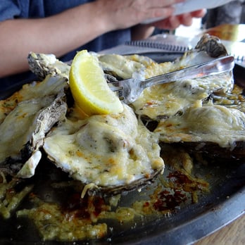 Caps On The Water - As you can see, the Garlic Oysters were huge! My first time having baked oysters (I normally eat them raw). Florida's Viagra at its finest! - Seafood Near Me - St Augustine, Florida Caps On The Water - As you can see, the Garlic Oysters were huge! My first time having baked oysters (I normally eat them raw). Florida's Viagra at its finest! - Seafood Near Me - St Augustine, Florida