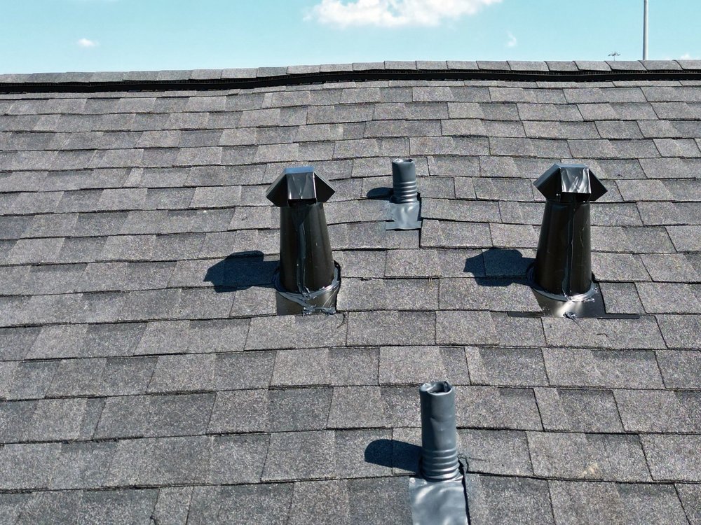 Slide of Whatley Roofing