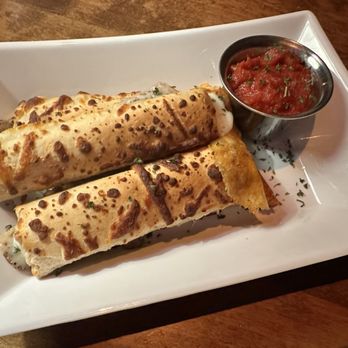 Atlas9 - Cheese Stuffed Breadsticks appetizer in the Speakereasy. - Performing Arts Near Me - Kansas City, Kansas