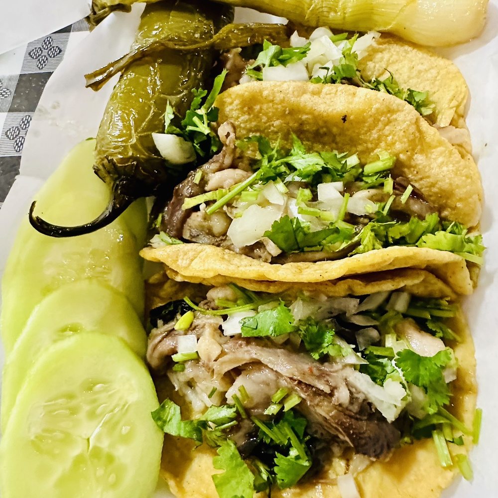 Tacos de cabeza (veil head tacos ) With a Chile toriado & grilled onions. Tacos de cabeza (veil head tacos ) With a Chile toriado & grilled onions.