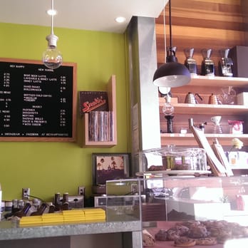 Hey Happy - Menu board has nice selection of coffee anf tea, including roasts from around the world - Coffee & Tea Near Me - Victoria, British Columbia