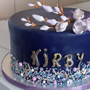 Ultimate Bakery Shop - a cake decorated with flowers - Bakeries Near Me - Brooklyn, New York