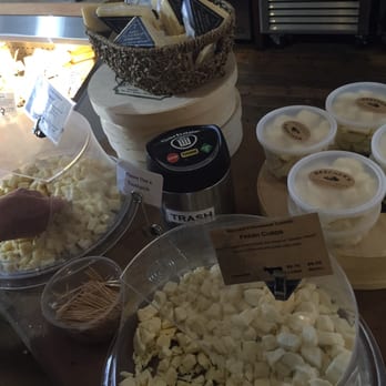 Beecher's Handmade Cheese - Cheese curd samples! I love this place! - Cheese Shops Near Me - Seattle, Washington