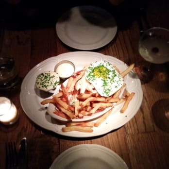 Au Cheval - French fries with mornay sauce and egg - Bars Near Me - Chicago, Illinois Au Cheval - French fries with mornay sauce and egg - Bars Near Me - Chicago, Illinois