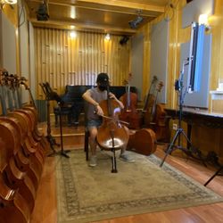 Flushing Violin Shop - Doing a little bit of performance with his newly tuned cello!