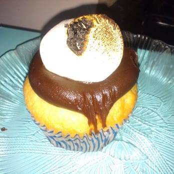 Fluffy Thoughts Cakes - Marshmallow over chocolate butter cream on vanilla cupcake filled w/marshmallow cream - Bakeries Near Me - McLean, Virginia