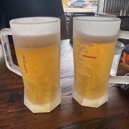 Beer served in frosty mugs Beer served in frosty mugs