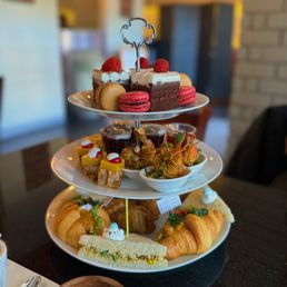 three tiered trays of pastries three tiered trays of pastries