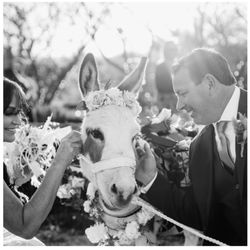 Tucson Event Rentals - Bride and groom with drink donkey