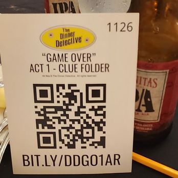 The Dinner Detective - a bottle of beer and a qr code - Dinner Theater Near Me - Seattle, Washington The Dinner Detective - a bottle of beer and a qr code - Dinner Theater Near Me - Seattle, Washington
