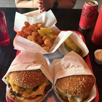 Butter's Burgers - Double Royale, and single Royale, tots and whole pickle on side - Burgers Near Me - Napa, California Butter's Burgers - Double Royale, and single Royale, tots and whole pickle on side - Burgers Near Me - Napa, California
