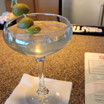 Silks Saratoga Bistro - a martini with olives in it - New American Near Me - Latham, New York Silks Saratoga Bistro - a martini with olives in it - New American Near Me - Latham, New York