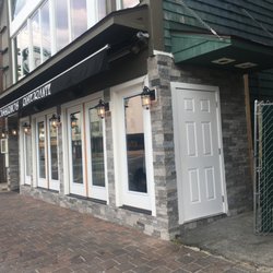 C & A Design and Construction - New exterior doors, trim, and stone veneer