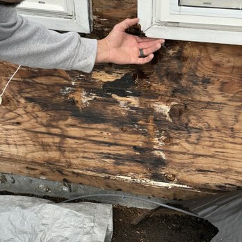 Z's County Construction - Zack shows areas that have been damaged by water getting thru the old cracked siding - General Contractors Near Me - Granite Falls, Washington