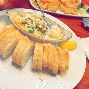 Jerry's Seafood - Crab dip with sliced baguette and fried calamari in the back - Seafood Near Me - Bowie, Maryland Jerry's Seafood - Crab dip with sliced baguette and fried calamari in the back - Seafood Near Me - Bowie, Maryland