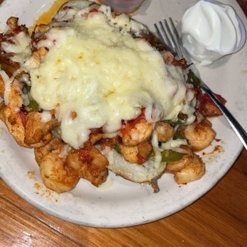 El Jimador Mexican Restaurant - Chicken and shrimp fajita baked potato - Mexican Near Me - Lanett, Alabama El Jimador Mexican Restaurant - Chicken and shrimp fajita baked potato - Mexican Near Me - Lanett, Alabama