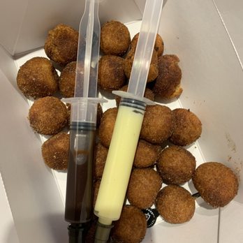 Topgolf - Donut holes with chocolate and custard injectable fillings - Golf Near Me - Roseville, California Topgolf - Donut holes with chocolate and custard injectable fillings - Golf Near Me - Roseville, California