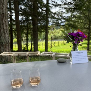 Perennial Vintners - two glasses of wine on a table - Wineries Near Me - Bainbridge Island, Washington