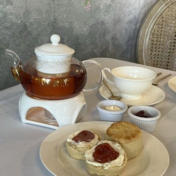Fleur de Thé - Tea party with teapot of black tea and tea scones with cream and jam - Tea Rooms Near Me - Saint Louis, Missouri Fleur de Thé - Tea party with teapot of black tea and tea scones with cream and jam - Tea Rooms Near Me - Saint Louis, Missouri