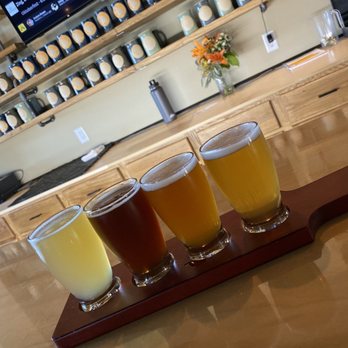 Drífa Brewing - Beer flight - from left to right - Lower Harbor Light, Enduro Brown, One More IPA, and Shiras Rye-PA - Breweries Near Me - Marquette, Michigan