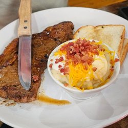 J&D’s Steakhouse - Steak and loaded mashed potatoes