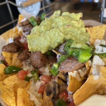 Backyard Tap House - Nachos with steak and Guacamole - American Near Me - Florence, Montana Backyard Tap House - Nachos with steak and Guacamole - American Near Me - Florence, Montana