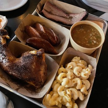 Hank's Texas BBQ - Three meat plate with dark chicken, sausage, brisket, baked beans, and Mac and cheese - Barbeque Near Me - Columbus, Ohio